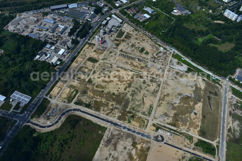 Aerial image Berlin Falkenberg Hohenschönhausen - View Cleared site on the ruins of the digesters and clarifiers of Falkenberg treatment plant in the district Hohenschonhausen - Marzahn in Berlin. The area is a developing area with commercial and industrial development to the CleanTech Business Park Berlin - Marzahn be expanded