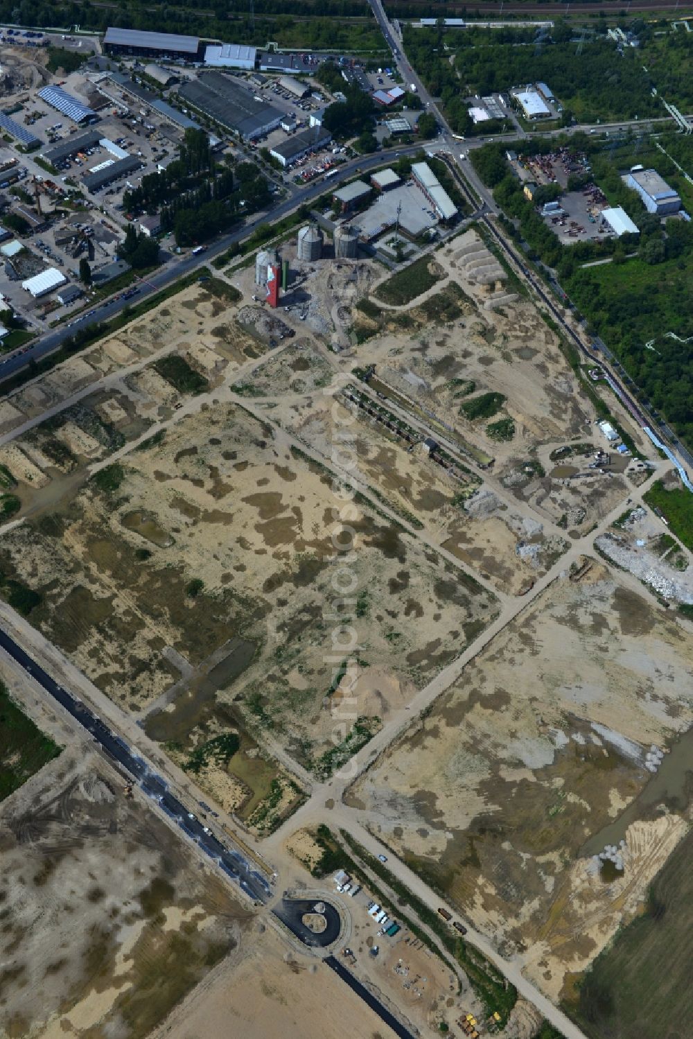 Berlin Falkenberg Hohenschönhausen from above - View Cleared site on the ruins of the digesters and clarifiers of Falkenberg treatment plant in the district Hohenschonhausen - Marzahn in Berlin. The area is a developing area with commercial and industrial development to the CleanTech Business Park Berlin - Marzahn be expanded