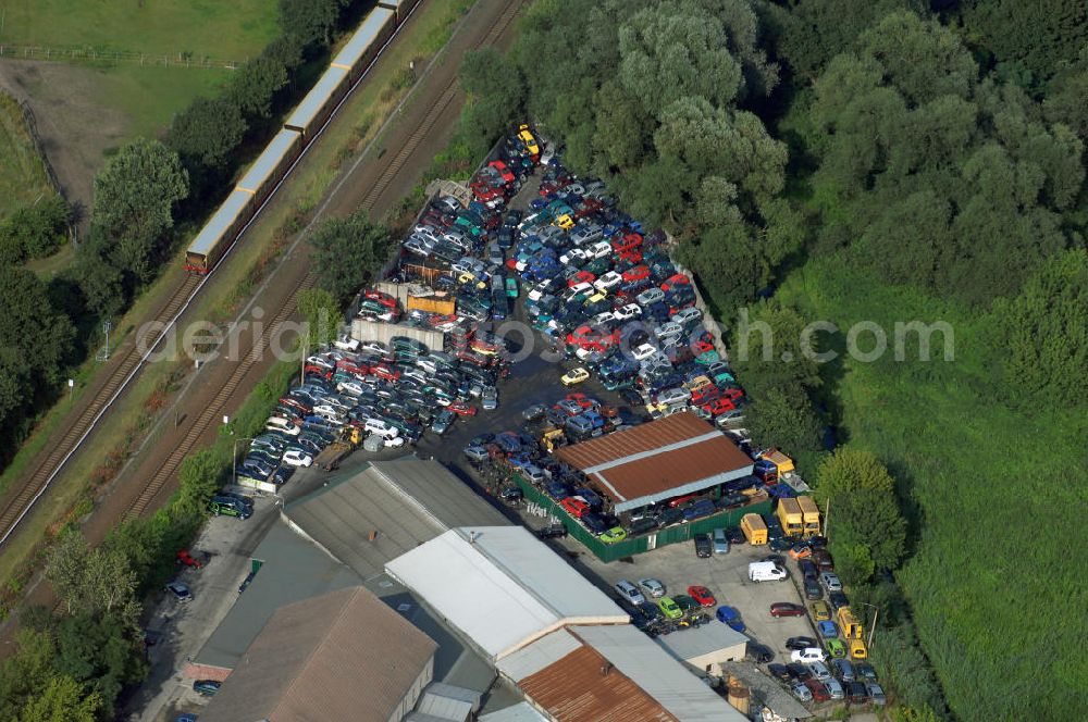 Neuenhagen from the bird's eye view: Blick auf die auf Grund der sogenannten Abwrackprämie übervollen Lagerflächen der Autoverwertung PRIES & FRIESE am Rosa-Luxemburg-Damm 1 in 15366 Neuenhagen - Fredersdorf Tel.: 03342-234480