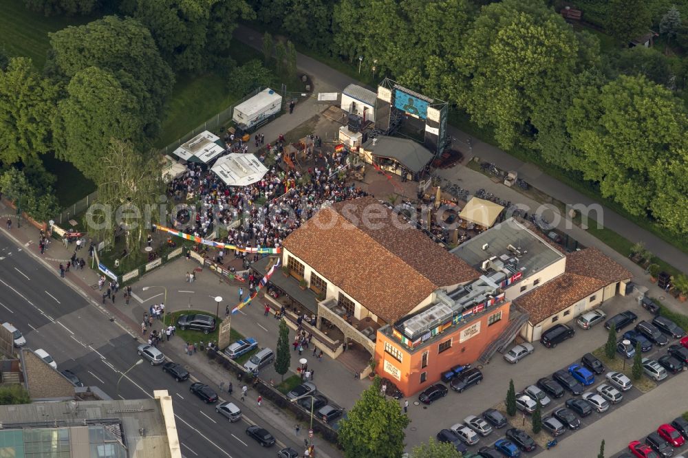 Bochum from the bird's eye view: Public viewing prior to the big screen at Celona Cafe in Essen on the occasion of European Championship quarter-final match between Germany and Greece