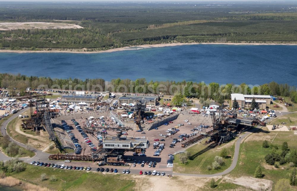 Aerial image Gräfenhainichen - Visitors look at the Melt! Festival in the iron city Ferropolis in Graefenhainichen in the state of Saxony-Anhalt. The Melt is a Musikfestiva with electronic music and Rock Sound. Since 1999 the festival at Graefenhainichen takes place in the City of Steel Ferropolis