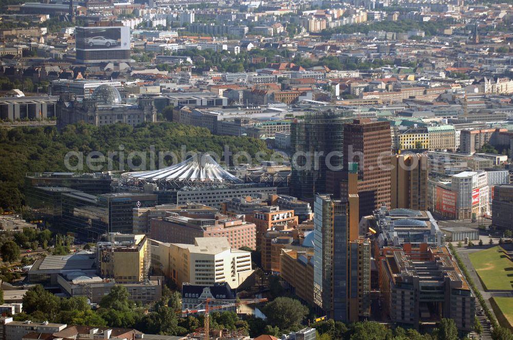 Berlin from above - Blick auf den Besucher- und Touristenmagnet Potsdamer Platz in Berlin-Mitte. Mit im Bild das Sony-Center, der Bahntower, sowie im Hintergrund erkennbar der Berliner reichstag, Brandenburger Tor.