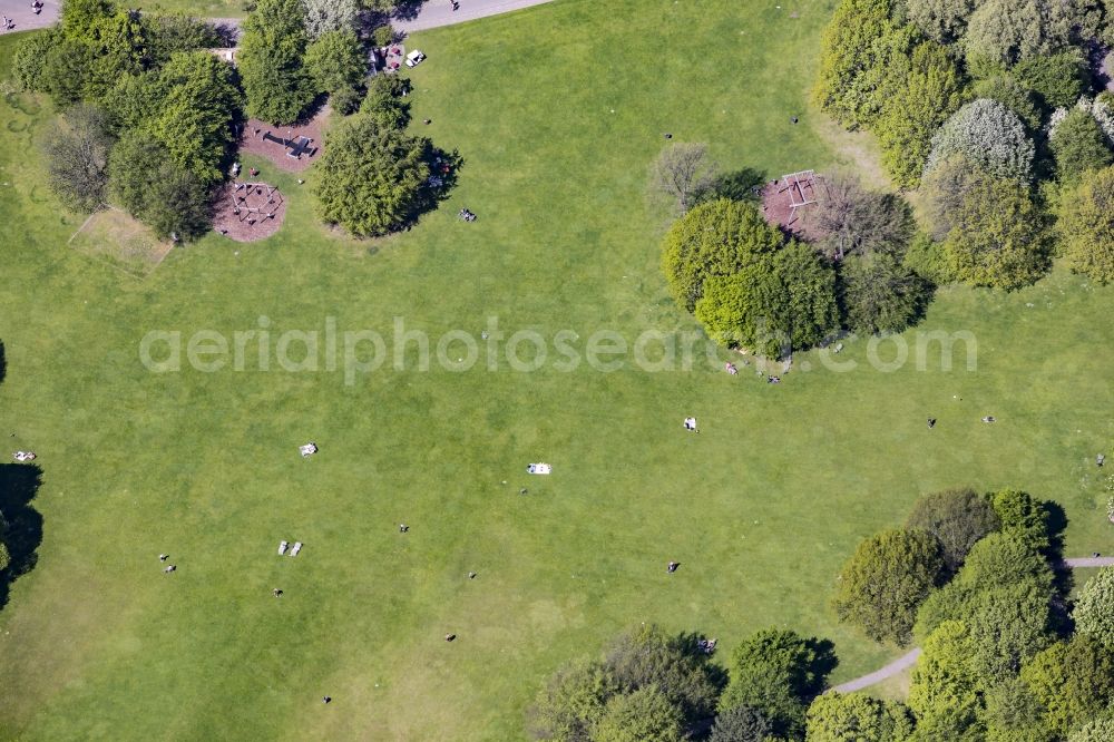 Berlin from the bird's eye view: Visitors on a lawn in the Britzer Garten park in the Britz part of the district of Neukoelln in Berlin