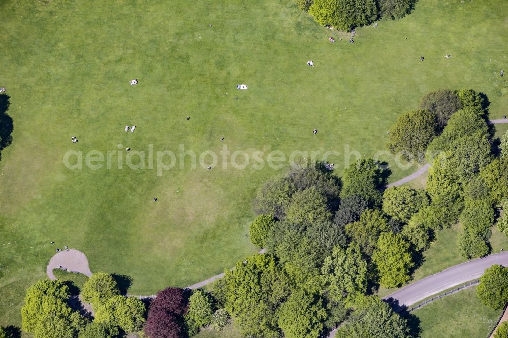 Aerial image Berlin - Visitors on a lawn in the Britzer Garten park in the Britz part of the district of Neukoelln in Berlin