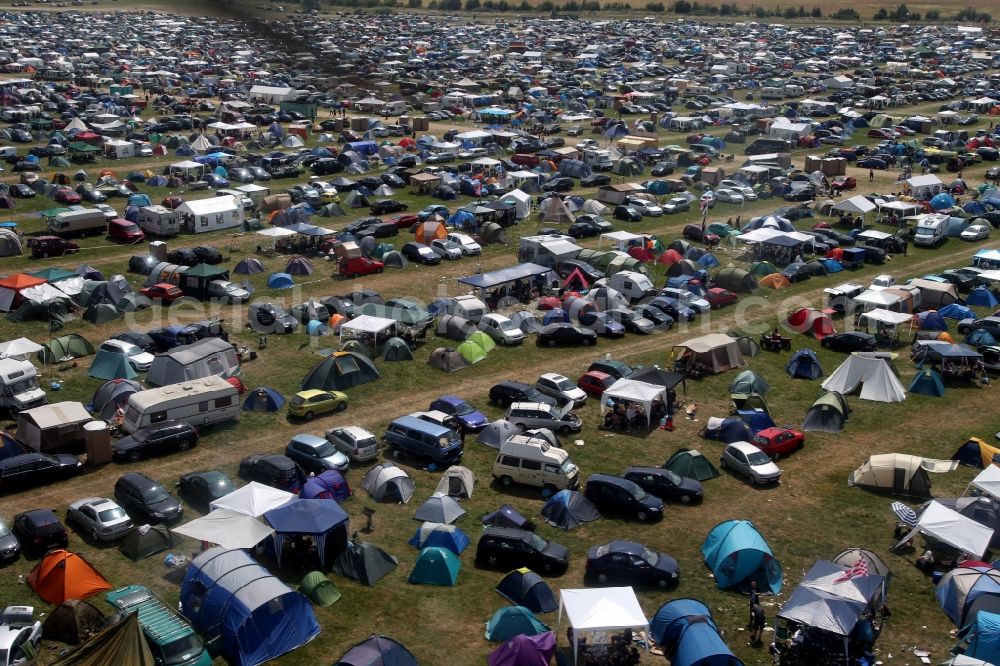 Ballenstedt from the bird's eye view: Visitors crowd filled with tents on the grounds of the Rock Harz - Festival at the airfield Ballenstedt in Saxony-Anhalt