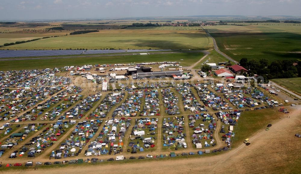 Aerial photograph Ballenstedt - Visitors crowd filled with tents on the grounds of the Rock Harz - Festival at the airfield Ballenstedt in Saxony-Anhalt