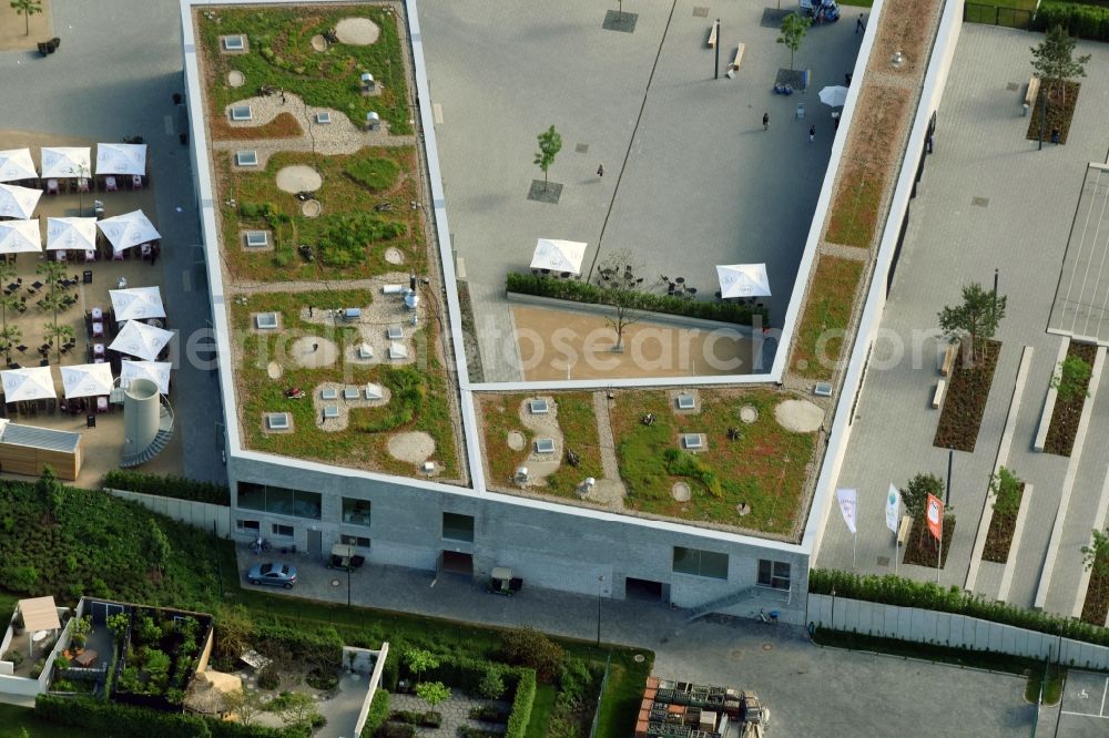 Aerial photograph Berlin - Visitor's centre at the main entrance of the IGA 2017 in the district of Marzahn-Hellersdorf in Berlin. The heart of the International gerden exibition will be the Gaerten der Welt. The visitor's centre is being built near the main entrance on Blumberger Damm