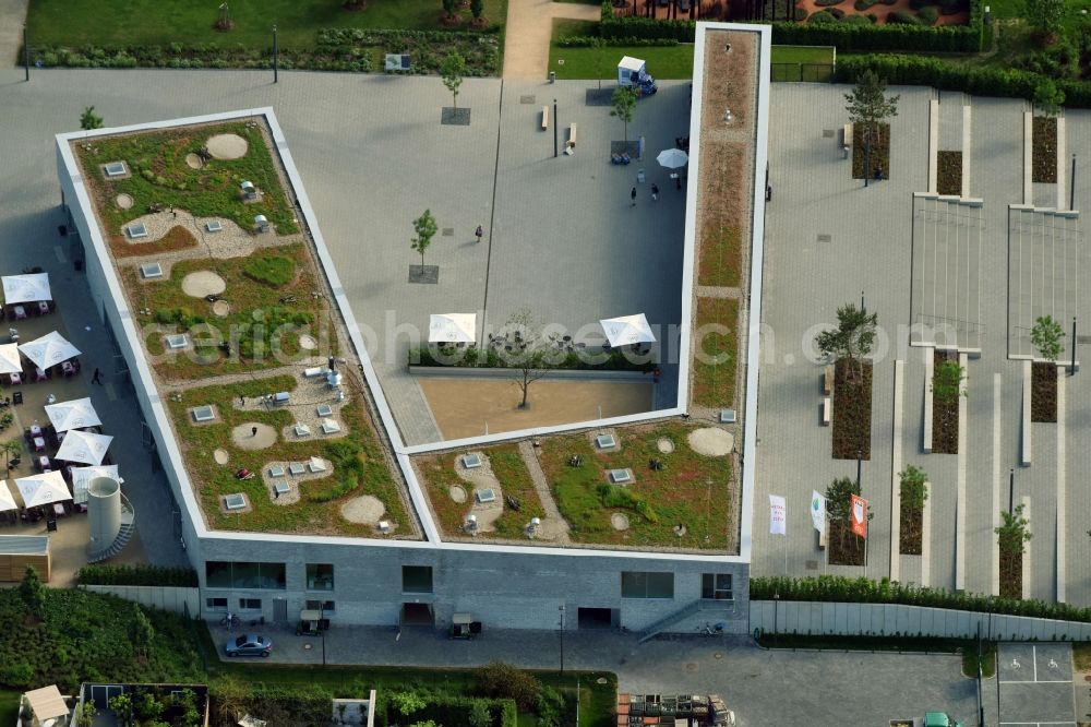 Berlin from the bird's eye view: Visitor's centre at the main entrance of the IGA 2017 in the district of Marzahn-Hellersdorf in Berlin. The heart of the International gerden exibition will be the Gaerten der Welt. The visitor's centre is being built near the main entrance on Blumberger Damm