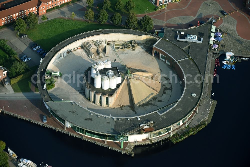 Aerial photograph Aurich - Mixed concrete and building materials factory of VETRA Beton Hasseburger Strasse at the Ems Jade canal in Aurich in the state Lower Saxony