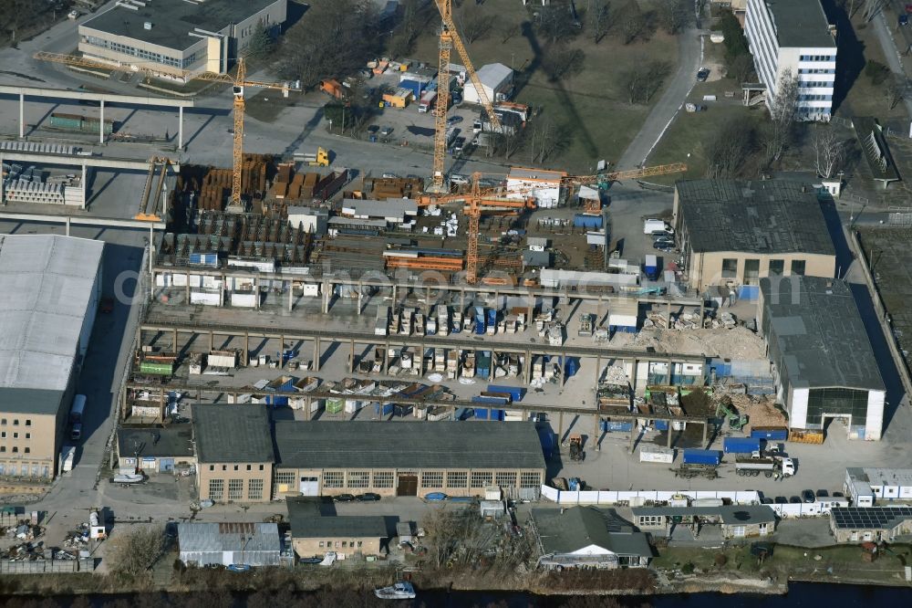 Berlin from the bird's eye view: Mixed concrete and building materials factory of Dahme Fertigteile GmbH on Gruenauer Strasse in the district Bezirk Treptow-Koepenick in Berlin