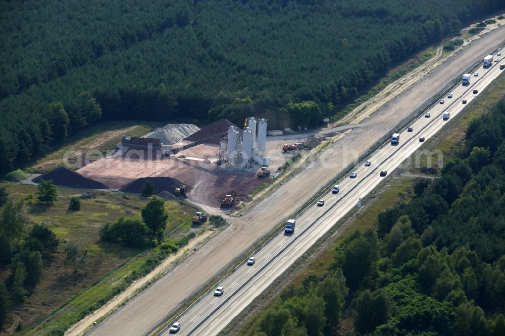 Friedrichshof from the bird's eye view: Concrete mixing plant to the expansion and widening of the route of the highway / motorway BAB A12 at Friedersdorf at the Berliner Ring in Brandenburg