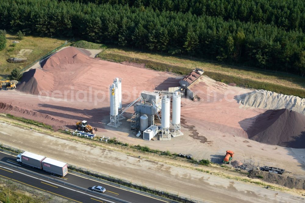Friedrichshof from above - Concrete mixing plant to the expansion and widening of the route of the highway / motorway BAB A12 at Friedersdorf at the Berliner Ring in Brandenburg