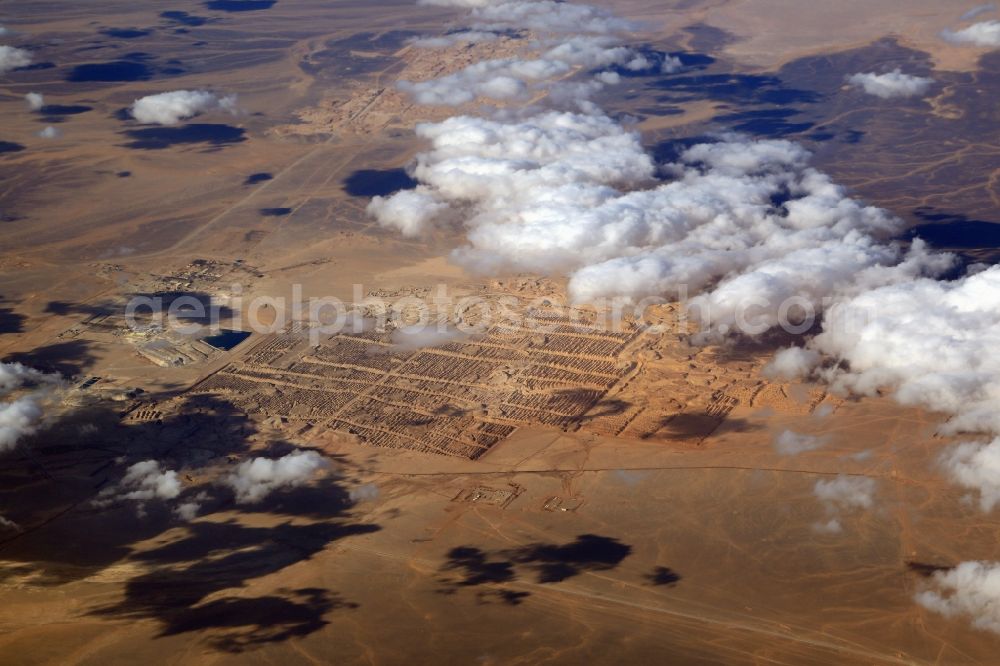 Aerial image Ma'an - Benefication plant Eshidiya of Jordan Phosphate Mines Company JPMC in the landscape of the Arab Desert in the area of Ma'an in Ma'an Governorate, Jordan. The mining company uses Phosphate to produce fertilizer