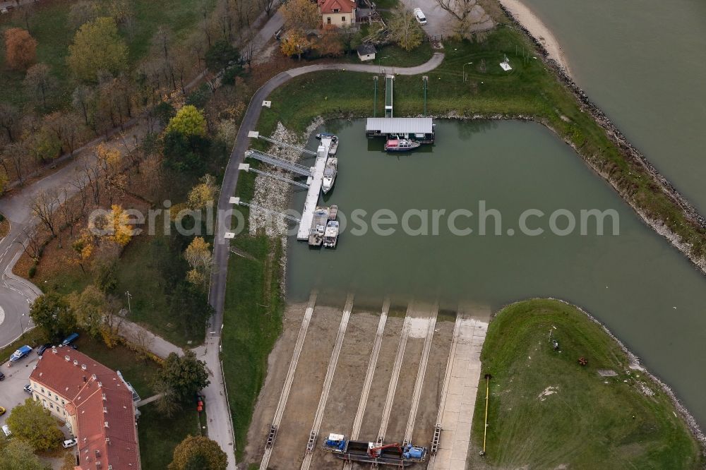 Bad Deutsch-Altenburg from the bird's eye view: Port facilities of viadonau on the riverbank of the Danube in Bad Deutsch-Altenburg in Lower Austria, Austria