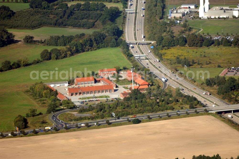 Rangsdorf from the bird's eye view: Site of the depot of the Autobahnmeisterei of Landesbetrieb Strassenwesen at the southern Berliner Ring motorway A10 in Rangsdorf in the state Brandenburg