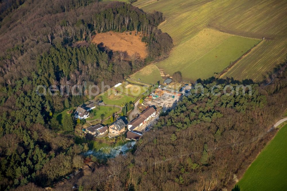 Aerial photograph Witten - Forest framed sites of the depot of the building company Korte GmbH & Co. KG as well as gardening and landscaping firm Geschwister Mueller/Korte GbR in Witten in the state North Rhine-Westphalia