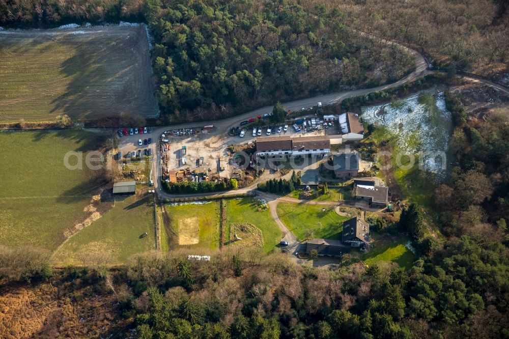 Witten from above - Forest framed sites of the depot of the building company Korte GmbH & Co. KG as well as gardening and landscaping firm Geschwister Mueller/Korte GbR in Witten in the state North Rhine-Westphalia