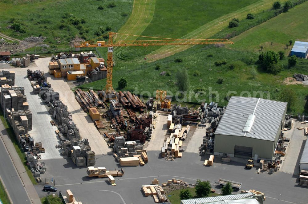 Aerial photograph Oebisfelde - Blick auf den Betriebshof der EUROVIA Beton GmbH am Gewerbegebiet West 7 in 39646 Oebisfelde in Sachsen-Anhalt. Die EUROVIA Infrastructure GmbH ist ein führendes Unternehmen im Verkehrswegebau. View of the depot, the concrete EUROVIA Infrastructure GmbH on industrial West 7 in 39646 Oebisfelde in Saxony-Anhalt. The EUROVIA Infrastructure GmbH is a leading company in road construction.