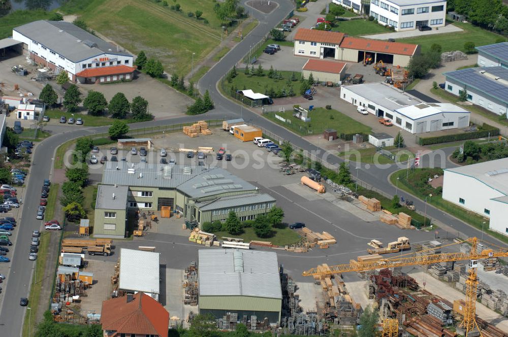 Aerial photograph Oebisfelde - Blick auf den Betriebshof der EUROVIA Beton GmbH am Gewerbegebiet West 7 in 39646 Oebisfelde in Sachsen-Anhalt. Die EUROVIA Infrastructure GmbH ist ein führendes Unternehmen im Verkehrswegebau. View of the depot, the concrete EUROVIA Infrastructure GmbH on industrial West 7 in 39646 Oebisfelde in Saxony-Anhalt. The EUROVIA Infrastructure GmbH is a leading company in road construction.