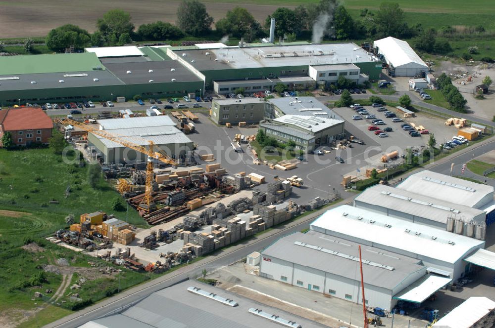 Aerial photograph Oebisfelde - Blick auf den Betriebshof der EUROVIA Beton GmbH am Gewerbegebiet West 7 in 39646 Oebisfelde in Sachsen-Anhalt. Die EUROVIA Infrastructure GmbH ist ein führendes Unternehmen im Verkehrswegebau. View of the depot, the concrete EUROVIA Infrastructure GmbH on industrial West 7 in 39646 Oebisfelde in Saxony-Anhalt. The EUROVIA Infrastructure GmbH is a leading company in road construction.