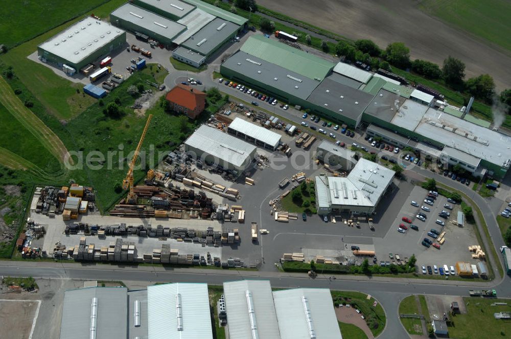 Aerial photograph Oebisfelde - Blick auf den Betriebshof der EUROVIA Beton GmbH am Gewerbegebiet West 7 in 39646 Oebisfelde in Sachsen-Anhalt. Die EUROVIA Infrastructure GmbH ist ein führendes Unternehmen im Verkehrswegebau. View of the depot, the concrete EUROVIA Infrastructure GmbH on industrial West 7 in 39646 Oebisfelde in Saxony-Anhalt. The EUROVIA Infrastructure GmbH is a leading company in road construction.