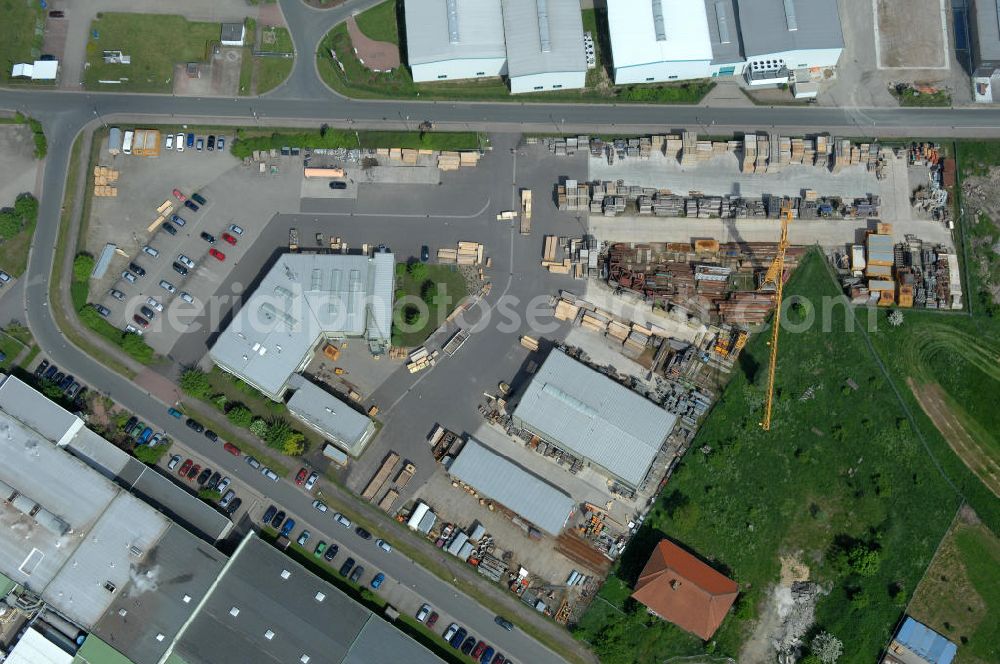 Aerial photograph Oebisfelde - Blick auf den Betriebshof der EUROVIA Beton GmbH am Gewerbegebiet West 7 in 39646 Oebisfelde in Sachsen-Anhalt. Die EUROVIA Infrastructure GmbH ist ein führendes Unternehmen im Verkehrswegebau. View of the depot, the concrete EUROVIA Infrastructure GmbH on industrial West 7 in 39646 Oebisfelde in Saxony-Anhalt. The EUROVIA Infrastructure GmbH is a leading company in road construction.