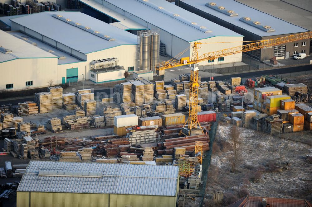 Aerial photograph Oebisfelde - Blick auf den Betriebshof der EUROVIA Beton GmbH am Gewerbegebiet West 7 in 39646 Oebisfelde in Sachsen-Anhalt. Die EUROVIA Infrastructure GmbH ist ein führendes Unternehmen im Verkehrswegebau. View of the depot, the concrete EUROVIA Infrastructure GmbH on industrial West 7 in 39646 Oebisfelde in Saxony-Anhalt. The EUROVIA Infrastructure GmbH is a leading company in road construction.