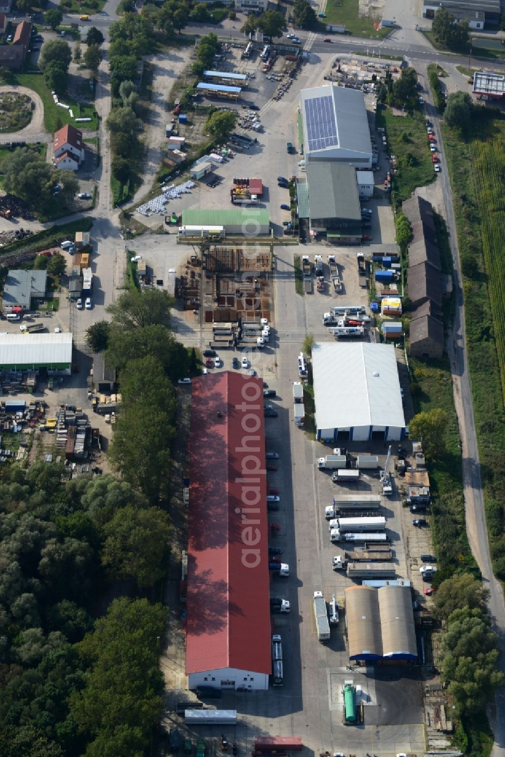 Mittenwalde from the bird's eye view: Depot with the headquarters of GAAC Commerz GmbH in the commercial area Mittenwalde in Brandenburg