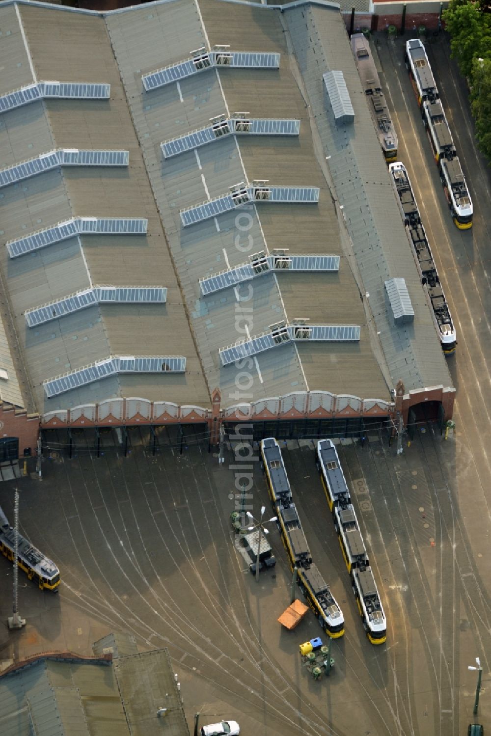 Aerial photograph Berlin - Maintenance and storage facility on Wendenschlossstrasse in the Koepenick part of Berlin in Germany. The historic depot is a tram station which is run by the Berlin transportation company BVG and is used for the 60 lines of the Berlin trams