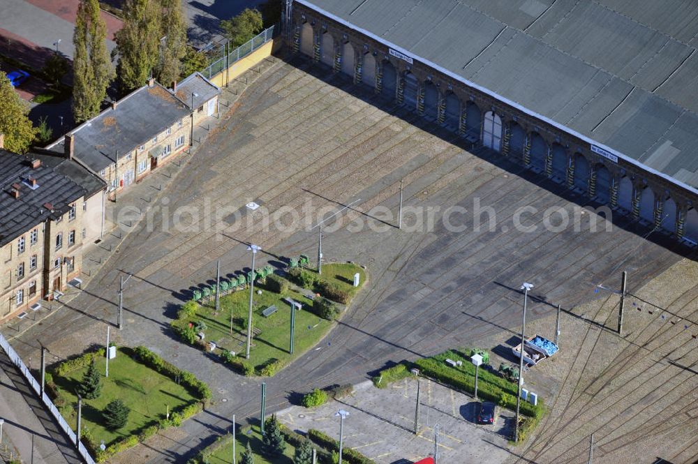 Aerial photograph Berlin Niederschönhausen - Der Betriebshof Niederschönhausen in Berlin Pankow ist ein Straßenbahndepot der Berliner Verkehrsbetriebe (BVG). Der Komplex wurde anfang des 20. Jahrhunderts erbaut und steht unter Denkmalschutz. The depot Niederschönhausen in Berlin Pankow is a tram depot und is used by the Berliner Verkehrsbetriebe (BVG). The complex was built in the beginning of the 20th century and is a landmarked building.