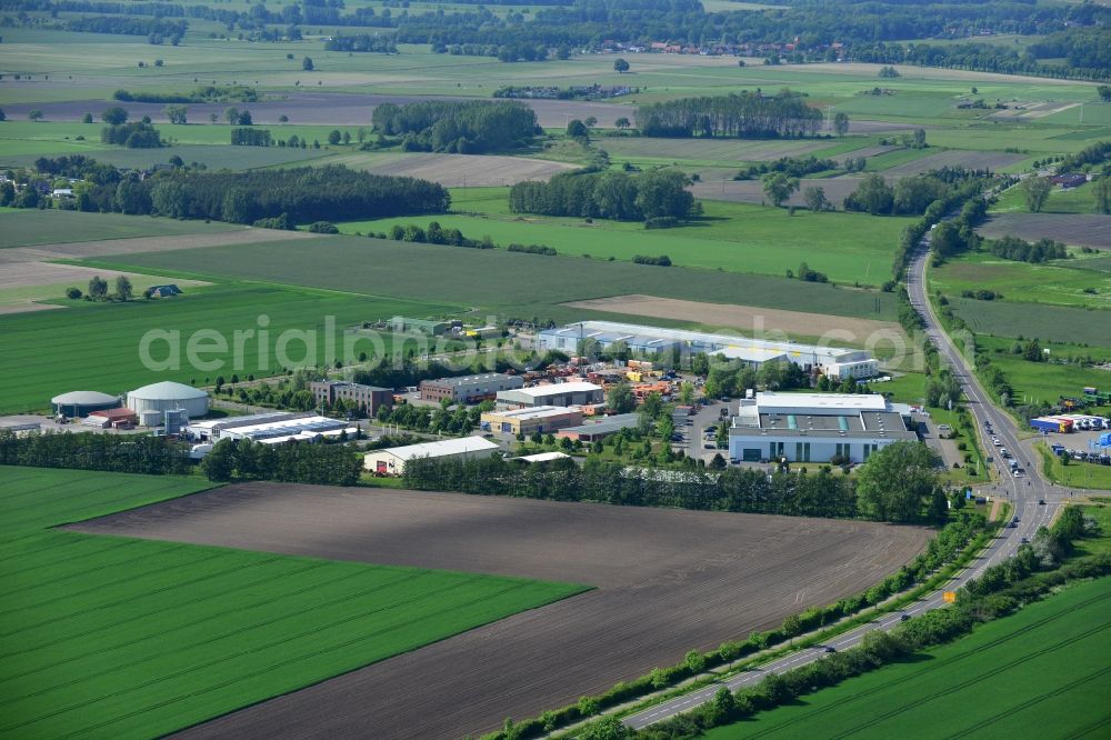 Osterburg from the bird's eye view: Depot of the Ost Bau GmbH in Osterburg in the Altmark in Saxony-Anhalt