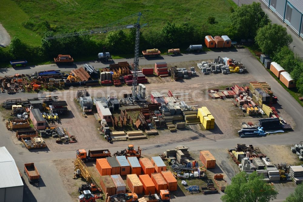 Osterburg from the bird's eye view: Depot of the Ost Bau GmbH in Osterburg in the Altmark in Saxony-Anhalt