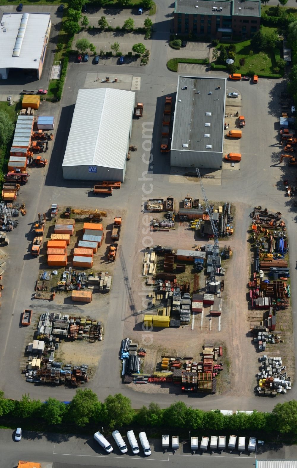 Osterburg from the bird's eye view: Depot of the Ost Bau GmbH in Osterburg in the Altmark in Saxony-Anhalt