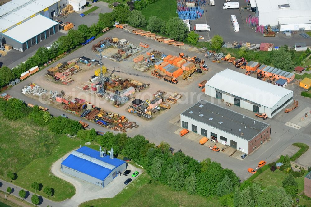 Osterburg from the bird's eye view: Depot of the Ost Bau GmbH in Osterburg in the Altmark in Saxony-Anhalt