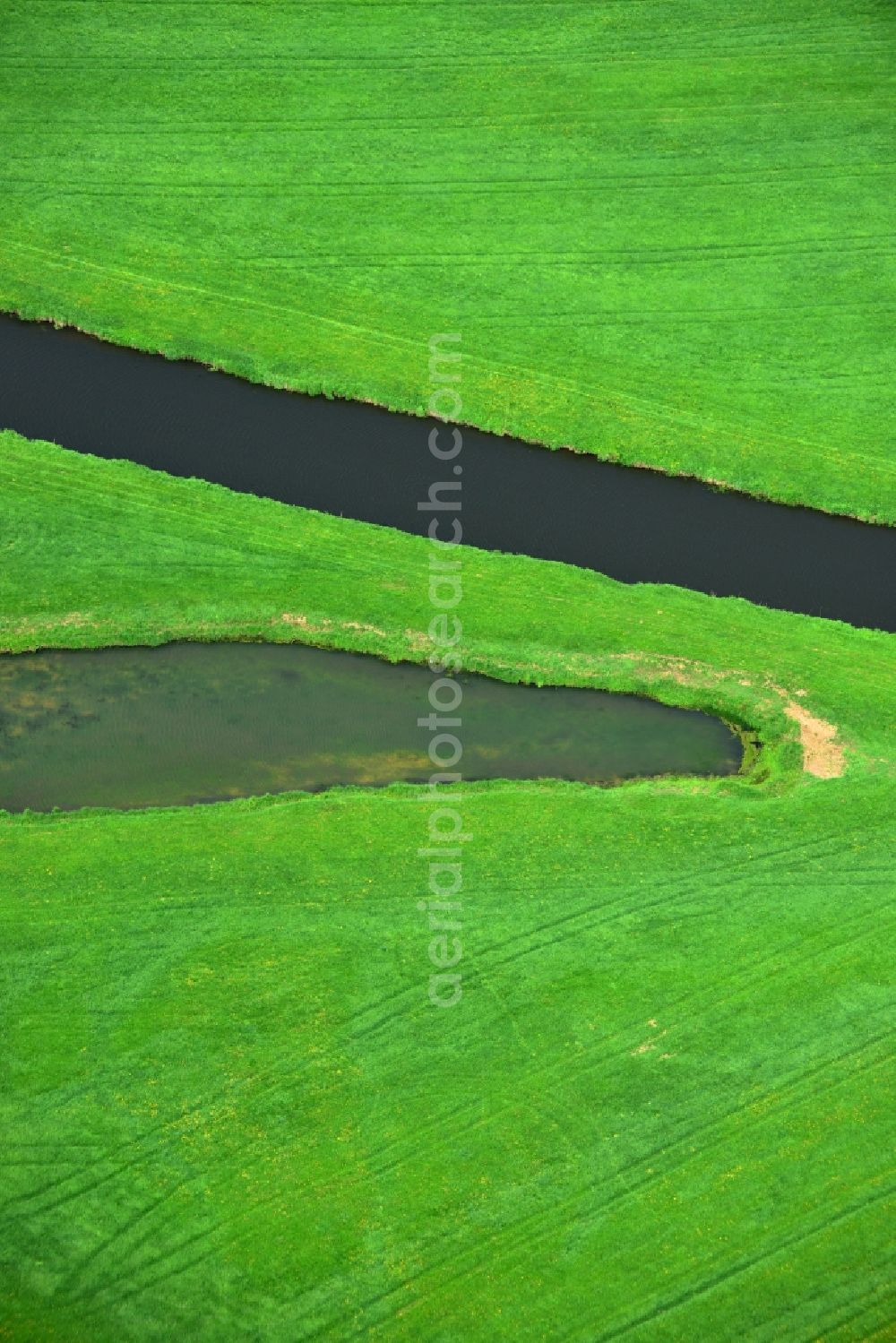 Aerial photograph Groß Schmölen - Irrigation canal for agriculture in Meloration - field - Landscape near Gross Schmoelen in Mecklenburg-Western Pomerania