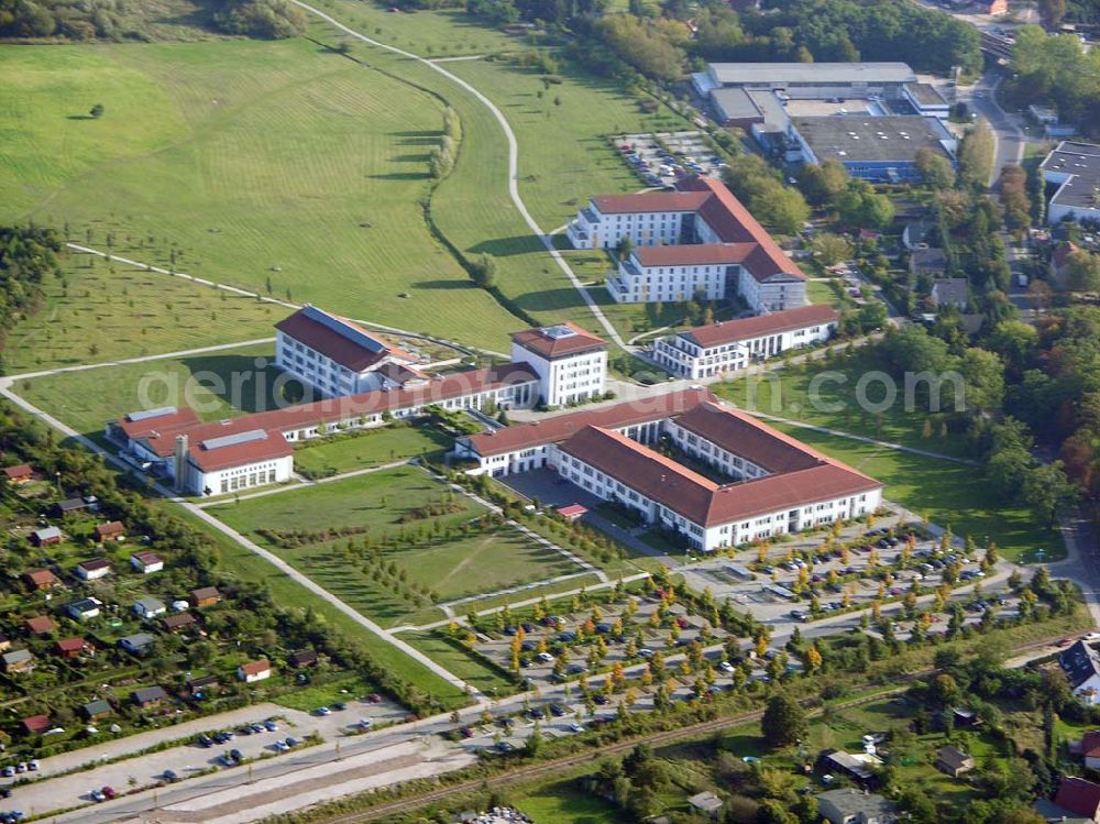 Mühlenbeck (Brandenburg) from above - Blick auf das Zentrum für berufliche Rehabilitation des Berufsförderungswerk (BFW) Brandenburg in Mühlenbeck nördlich von Berlin. der Gebäudekomplexe wurde im August 1995 eröffnet und bietet 500 Plätze zur beruflichen Qualifizierung durch erwachsenenorientierte, behindertengerechte Ausbildung in modernen Unterrichts- und Computerräumen sowie in praxisgerechten Werkstätten, Laboren und Übungsfirmen. Ebenso besteht dabei die Wohnmöglichkeit.