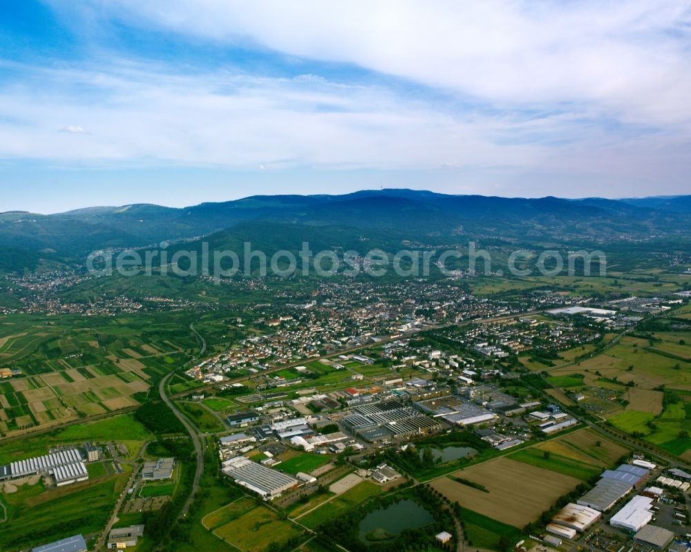 Bühl from above - The Black Forest in the state of Baden-Württemberg. Visible in the background is the broadcasting tower on the mountain Hornisgrinde, the highest mountain of the Northern Black Forest. The Black Forest is Germany's highest and largest connected low mountain range, located in the Sout West of the state of Baden-Württemberg. Today, it is mostly significant for its tourims sites and regions