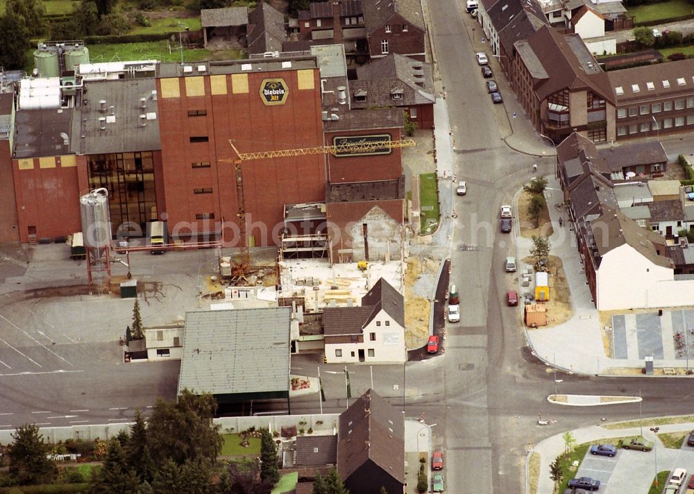 Issum from the bird's eye view: Building and production halls on the premises of the brewery Brauerei Diebels GmbH & Co. KG in Issum in the state North Rhine-Westphalia