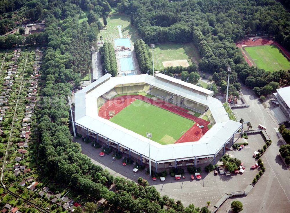 Aerial photograph Nürnberg - Blick auf das Franken-Stadion in Nürnberg, welches sich ebenso für Fußballspiele, wie für Leichtathletikveranstaltungen eignet. Das Stadion ist Heimstadion des Fußball-Bundesligisten 1. FC Nürnberg. Es entstand in seiner ursprünglichen und markanten achteckigen Form im Jahr 1928 mit einer Kapazität von 37.000 Zuschauern. Seit dem Ende der Umbauarbeiten am 24. April 2005 bietet es künftig rund 44.000 überdachte Sitzplätze. Architekt: Hentrich-Petschnigg & Partner KG