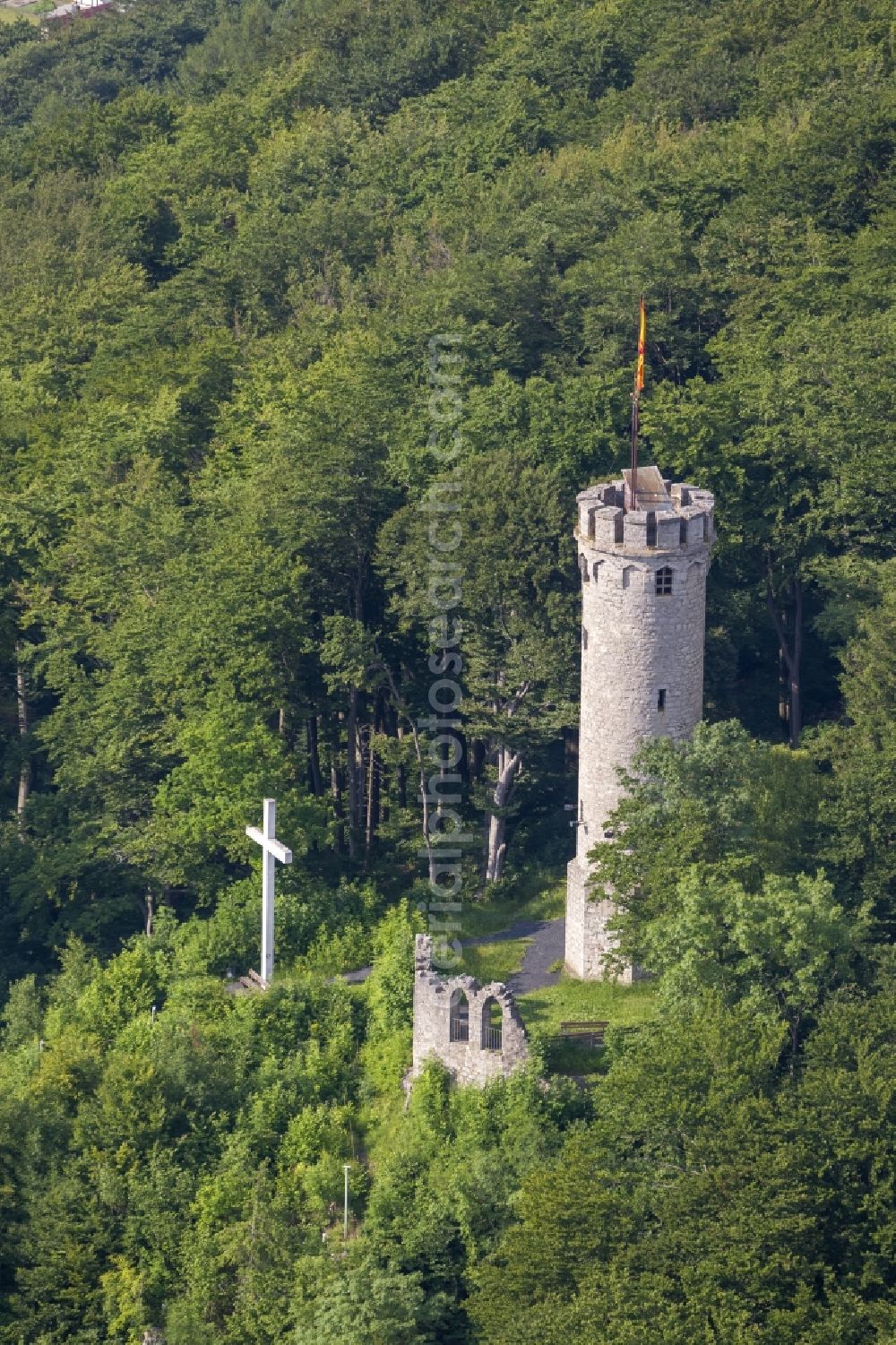 Marsberg from the bird's eye view: View of the Bilsteinturm, a round tower with a white cross and a ruin, on the mountain Bilstein in Marsberg in the state North Rhine-Westphalia. Since 2007 the tower is a listed monument