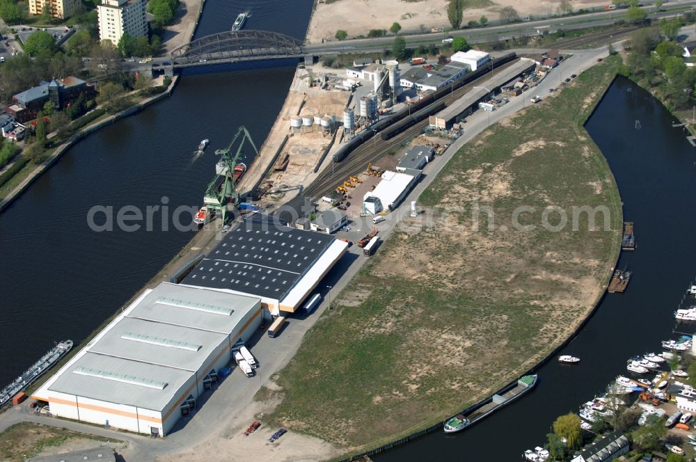 Berlin from the bird's eye view: Wharves and piers with ship loading terminals in the inner harbor Suedhafen on the Havel river in the district Spandau in Berlin, Germany