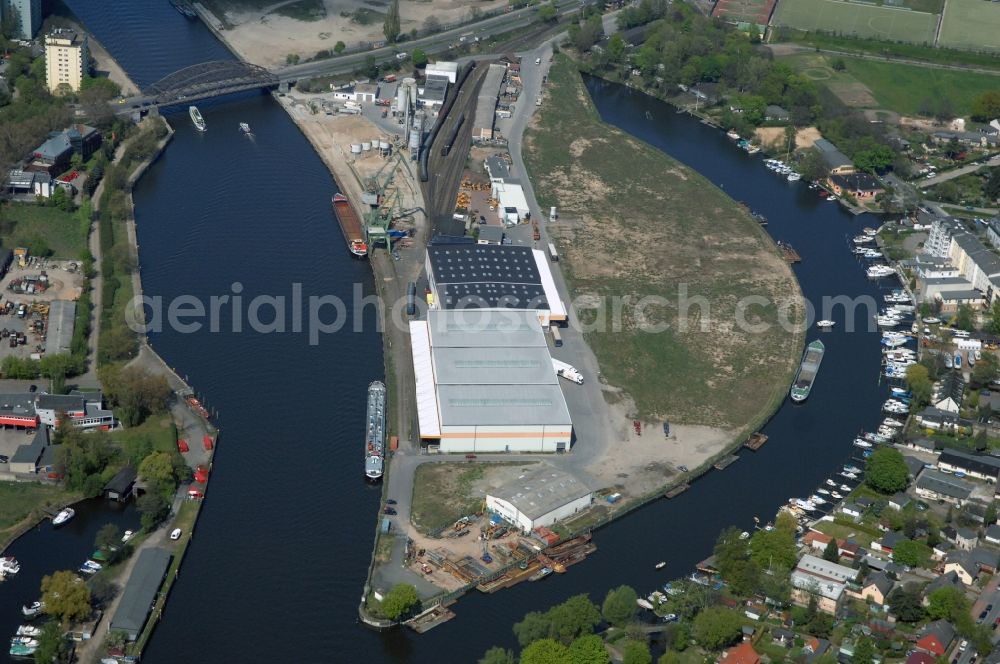 Berlin from the bird's eye view: Wharves and piers with ship loading terminals in the inner harbor Suedhafen on the Havel river in the district Spandau in Berlin, Germany