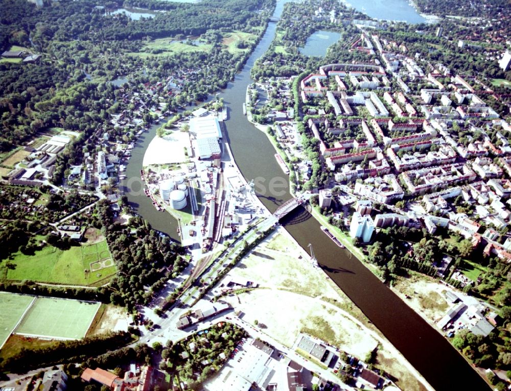 Berlin from above - Wharves and piers with ship loading terminals in the inner harbor Suedhafen on the Havel river in the district Spandau in Berlin, Germany