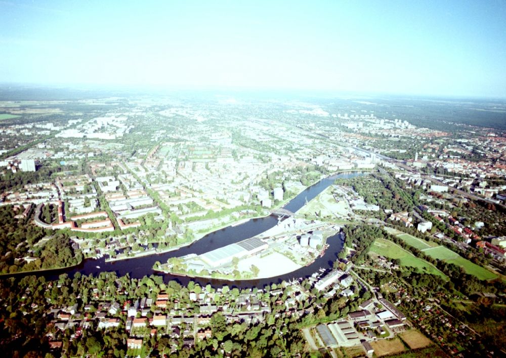 Berlin from the bird's eye view: Wharves and piers with ship loading terminals in the inner harbor Suedhafen on the Havel river in the district Spandau in Berlin, Germany