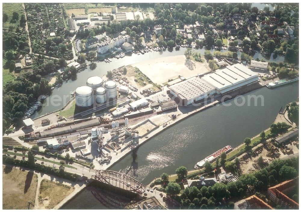 Berlin from above - Wharves and piers with ship loading terminals in the inner harbor Suedhafen on the Havel river in the district Spandau in Berlin, Germany