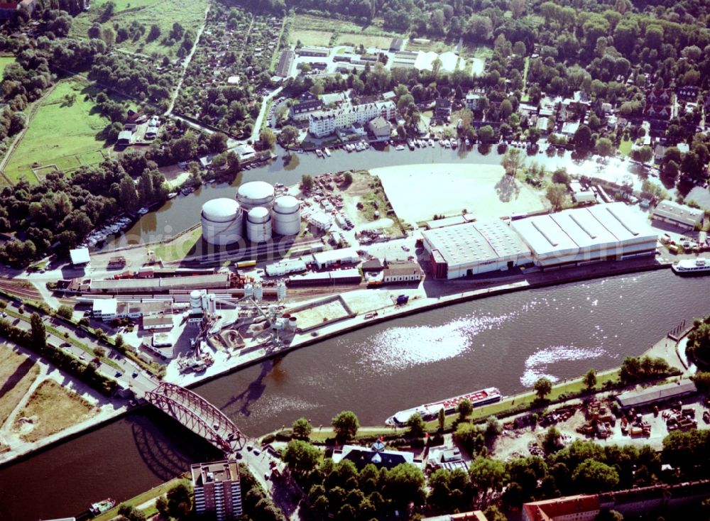 Berlin from the bird's eye view: Wharves and piers with ship loading terminals in the inner harbor Suedhafen on the Havel river in the district Spandau in Berlin, Germany