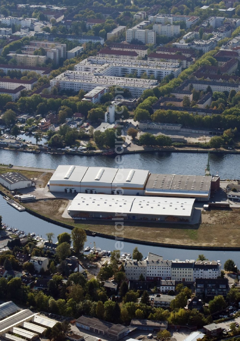 Berlin from the bird's eye view: Wharves and piers with ship loading terminals in the inner harbor Suedhafen on the Havel river in the district Spandau in Berlin, Germany