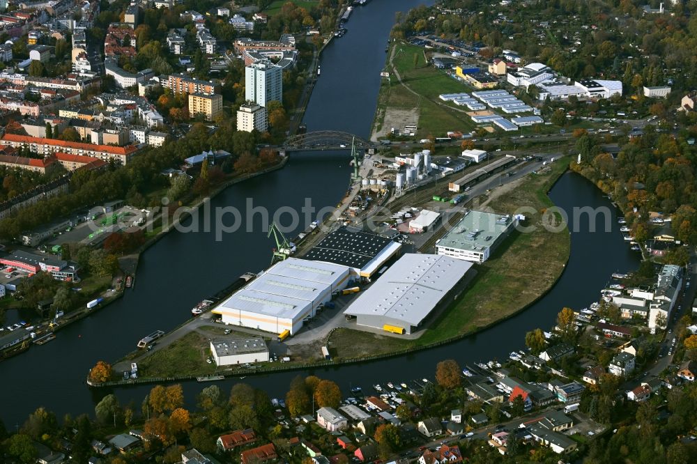 Berlin from above - Wharves and piers with ship loading terminals in the inner harbor Suedhafen on the Havel river in the district Spandau in Berlin, Germany