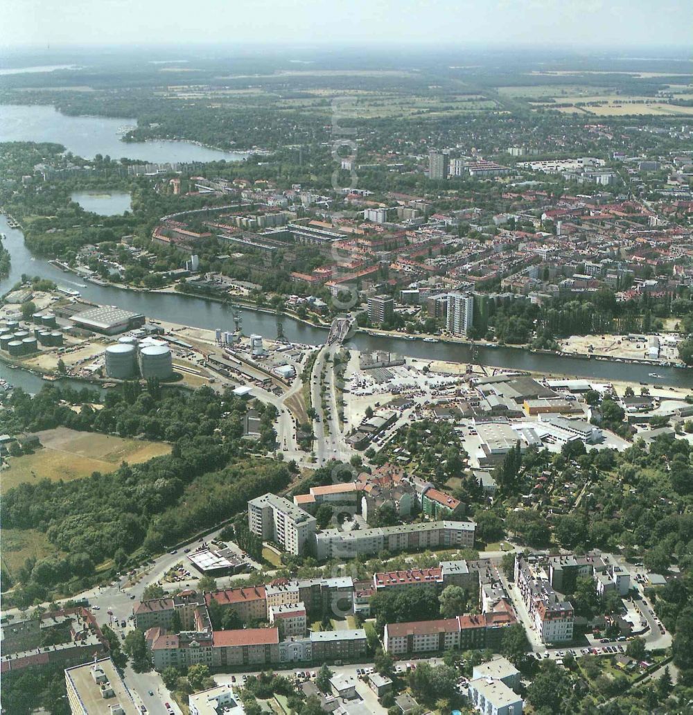 Berlin from above - Wharves and piers with ship loading terminals in the inner harbor Suedhafen on the Havel river in the district Spandau in Berlin, Germany