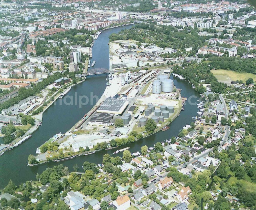 Berlin from above - Wharves and piers with ship loading terminals in the inner harbor Suedhafen on the Havel river in the district Spandau in Berlin, Germany